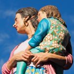 Woman, child, sculpture — Coronavirus disease 2019
